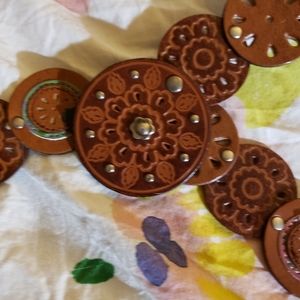 Leather belt that hooks up anywhere